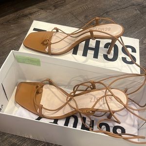 Lace up SCHUTZ tan heels. Never worn. Brand new.